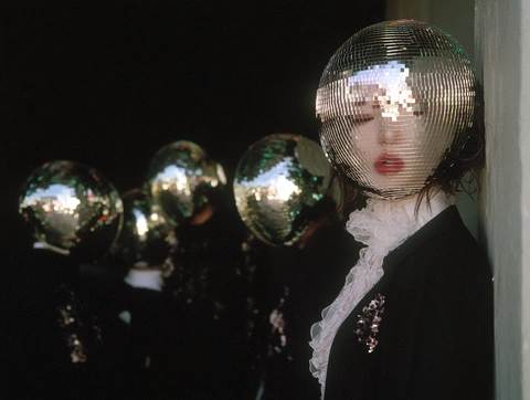 A portrait with mirrors and spheres