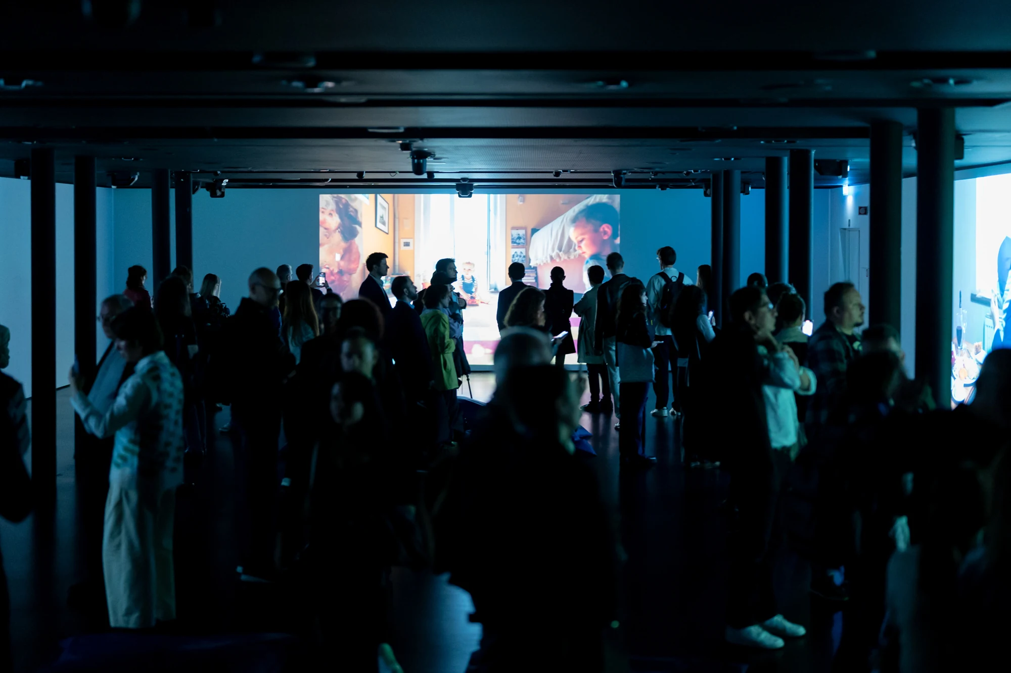 Visitors in the immersive room during the exhibition opening at MEET.